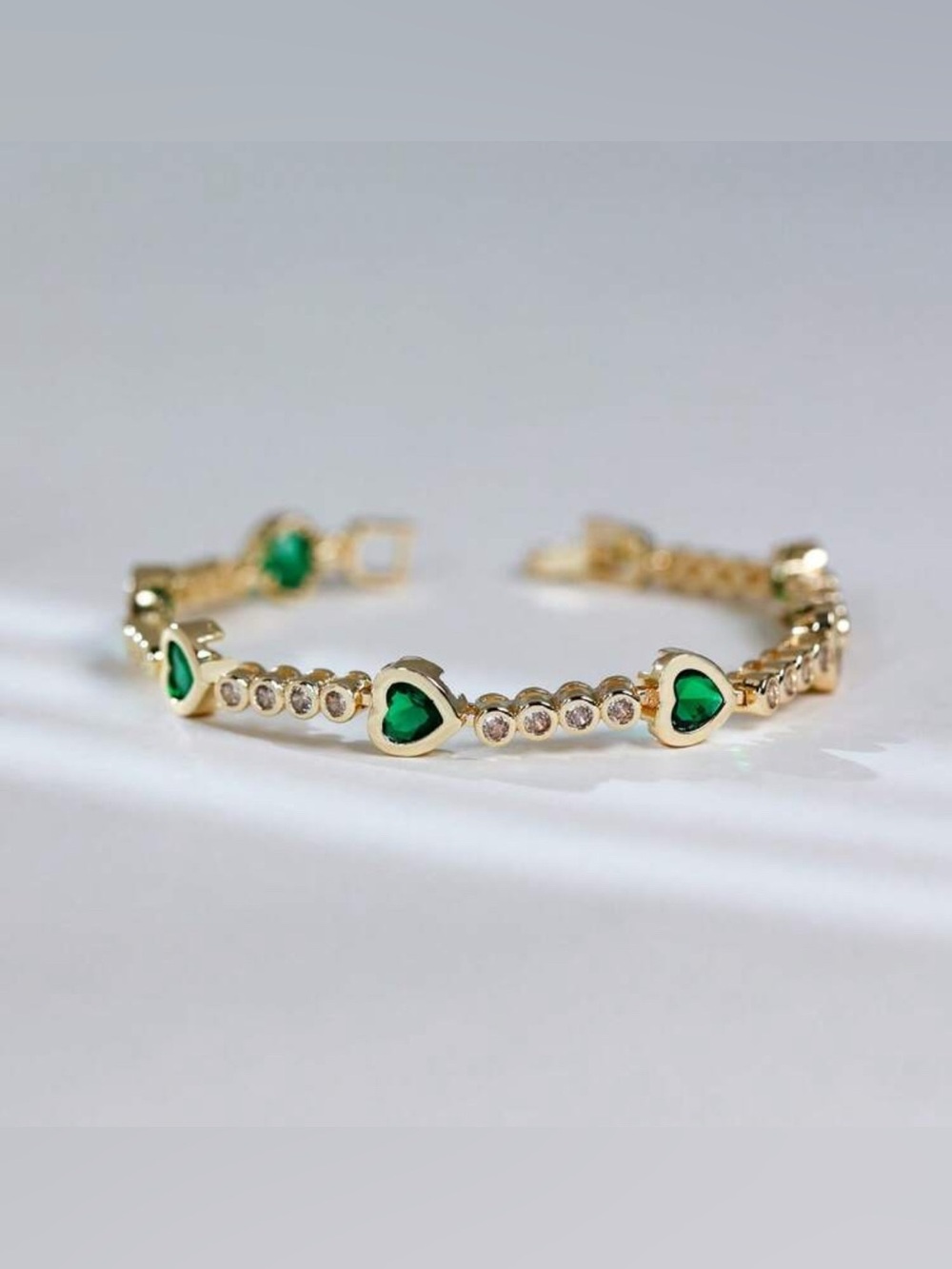 Gold Bracelet with Green Heart Accents N1469